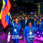 Delegación de Ecuador durante los Juegos Suramericanos Santa Fe 2026, con la bandera nacional al frente del Team Ecuador.